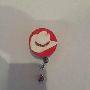 Retractable name badge holder